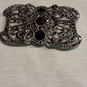 Elegant Black and Silver Brooch